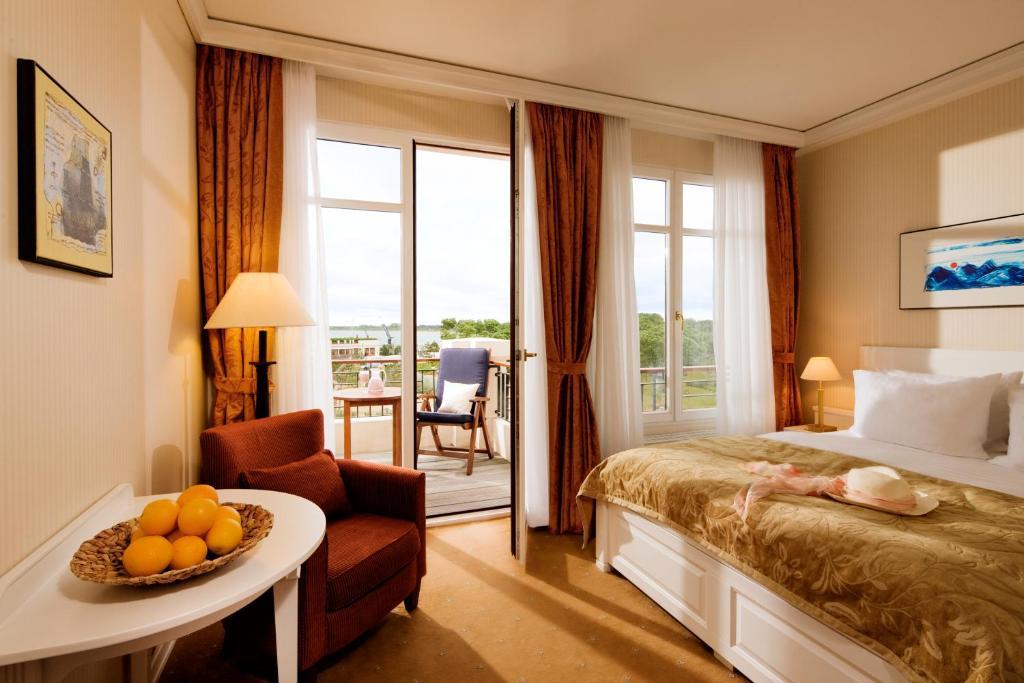 Отель Yachthafenresidenz Hohe Duene Росток Номер фото A room at the Hotel de la Plage